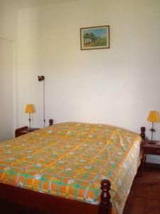 Rúm í herbergi á Villa Belle Frégate