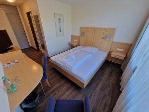 Postel nebo postele na pokoji v ubytování Nordic Avantage Hotel