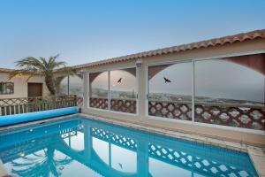 The swimming pool at or close to Villa Petite Paradise
