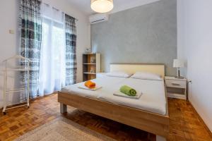 Postel nebo postele na pokoji v ubytování Apartment Suzy