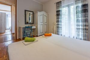 Postel nebo postele na pokoji v ubytování Apartment Suzy