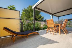 Balkón nebo terasa v ubytování Mobile home Kastanjola