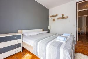 Postel nebo postele na pokoji v ubytování Apartment Suzy