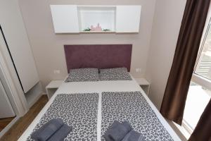 Postel nebo postele na pokoji v ubytování Mobile home Kastanjola