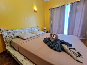 Postel nebo postele na pokoji v ubytování Villa ARC-EN-CIEL