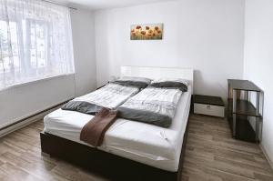 Postel nebo postele na pokoji v ubytování Penzion Zahrádka