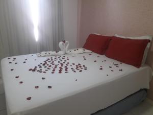 A bed or beds in a room at Flat Porto de Galinhas