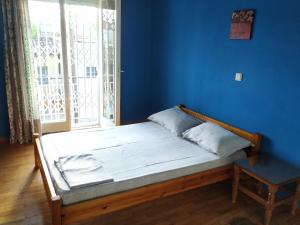 Postel nebo postele na pokoji v ubytování Central Kiato