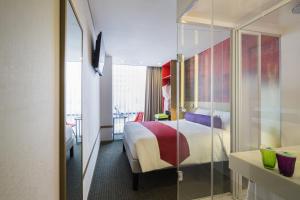 เตียงในห้องที่ ibis Styles Ambassador Seoul Myeong-dong