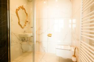 Koupelna v ubytování XuBa ApartmentRooms Messe Wien Prater
