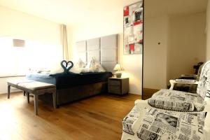 Postel nebo postele na pokoji v ubytování XuBa ApartmentRooms Messe Wien Prater