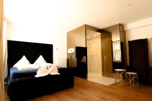 Postel nebo postele na pokoji v ubytování XuBa ApartmentRooms Messe Wien Prater