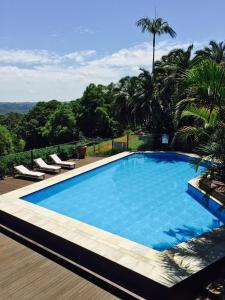 a beach with a pool and a pool table at Montville Holiday Apartments in Montville