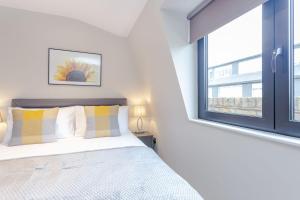 Cleveland Residences Farringdon客房内的一张或多张床位