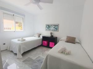 Posteľ alebo postele v izbe v ubytovaní Expoholidays- Primera línea con parking incluido
