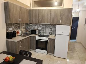 A kitchen or kitchenette at G&M Luxury Studios