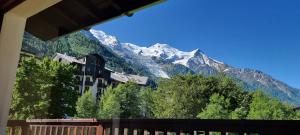 a building with a view of a mountain at Chalet Chintalaya in Chamonix-Mont-Blanc