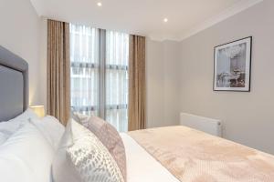 Cleveland Residences Farringdon客房内的一张或多张床位