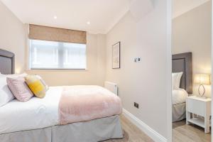 Cleveland Residences Farringdon客房内的一张或多张床位