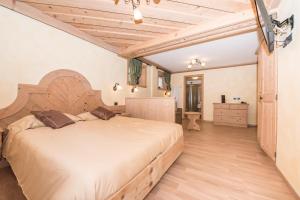 Postel nebo postele na pokoji v ubytování Hotel Capriolo