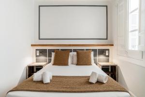Posteľ alebo postele v izbe v ubytovaní Casa Gracia Apartments