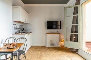 Kuchyňa alebo kuchynka v ubytovaní Casa Gracia Apartments
