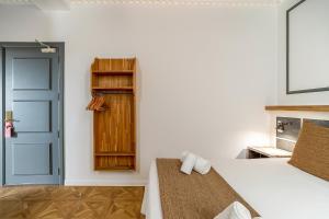 Posteľ alebo postele v izbe v ubytovaní Casa Gracia Apartments