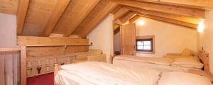 Postel nebo postele na pokoji v ubytování Hotel Capriolo