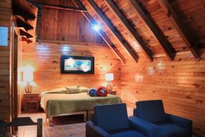 TV a/nebo společenská místnost v ubytování La Huerta + 30 fotografií
