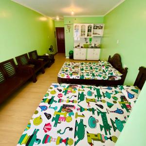 Un lugar para sentarse en Albergo Hotel - Studio Condo Unit - Baguio Transient