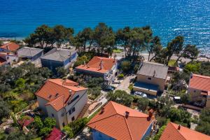 an aerial view of houses and the ocean at Apartman Marina in Martinšćica