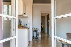 Kuchyňa alebo kuchynka v ubytovaní Casa Gracia Apartments