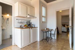 Kuchyňa alebo kuchynka v ubytovaní Casa Gracia Apartments