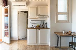 Kuchyňa alebo kuchynka v ubytovaní Casa Gracia Apartments