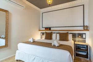 Posteľ alebo postele v izbe v ubytovaní Casa Gracia Apartments