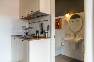 Kúpeľňa v ubytovaní Casa Gracia Apartments + 37 fotografií