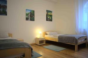Postel nebo postele na pokoji v ubytování Goldstadt Ferienwohnung