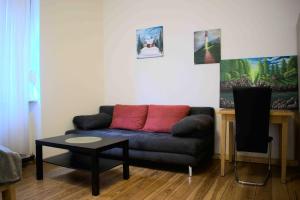 Posezení v ubytování Goldstadt Ferienwohnung