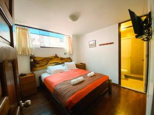 Llit o llits en una habitació de Nativus Hostel Machu Picchu