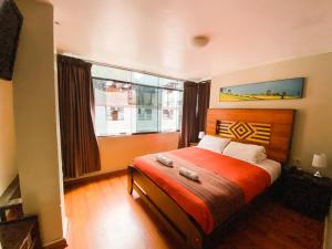 Llit o llits en una habitació de Nativus Hostel Machu Picchu