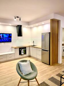 Η κουζίνα ή μικρή κουζίνα στο Apartament Nowomiejska