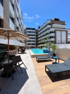Kolam renang di atau dekat dengan Goldflat - conforto no melhor do Cabo Branco