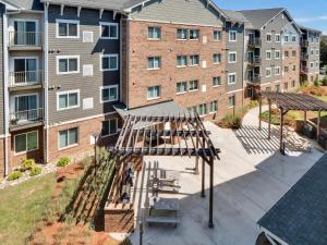 an overhead view of a patio in a apartment building at Waterwalk Charlotte Arrowood in Charlotte