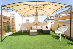 Posezení v ubytování ESSE Ático. Precioso ático con terraza en pleno centro