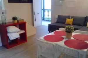 Posezení v ubytování ESSE Ático. Precioso ático con terraza en pleno centro