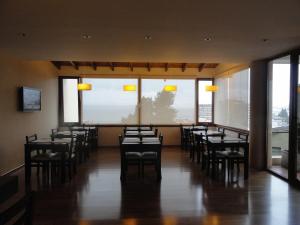 Uma TV ou centro de entretenimento em View Hotel BRC