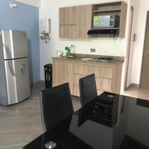 Cucina o angolo cottura di Apartahotel Avanti