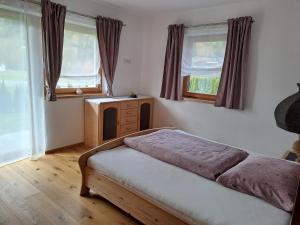 Postel nebo postele na pokoji v ubytování Ferienwohnung Widmann
