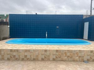Πισίνα στο ή κοντά στο Casa Familiar de Veraneio +7 φωτογραφίες