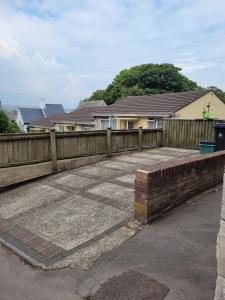 a wooden fence in front of a house at 39 Queens Road in Swanage